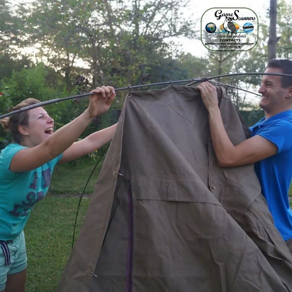 Home building in the newly arrived campsite.